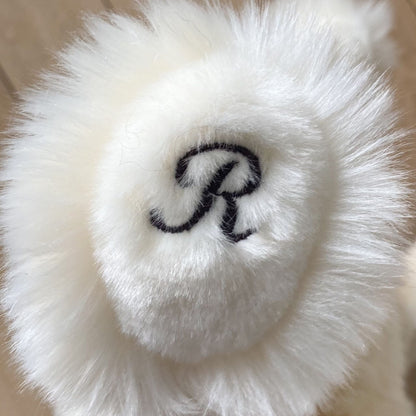 J'ajoute la broderie sur la patte de l'Ours Jules (80€)